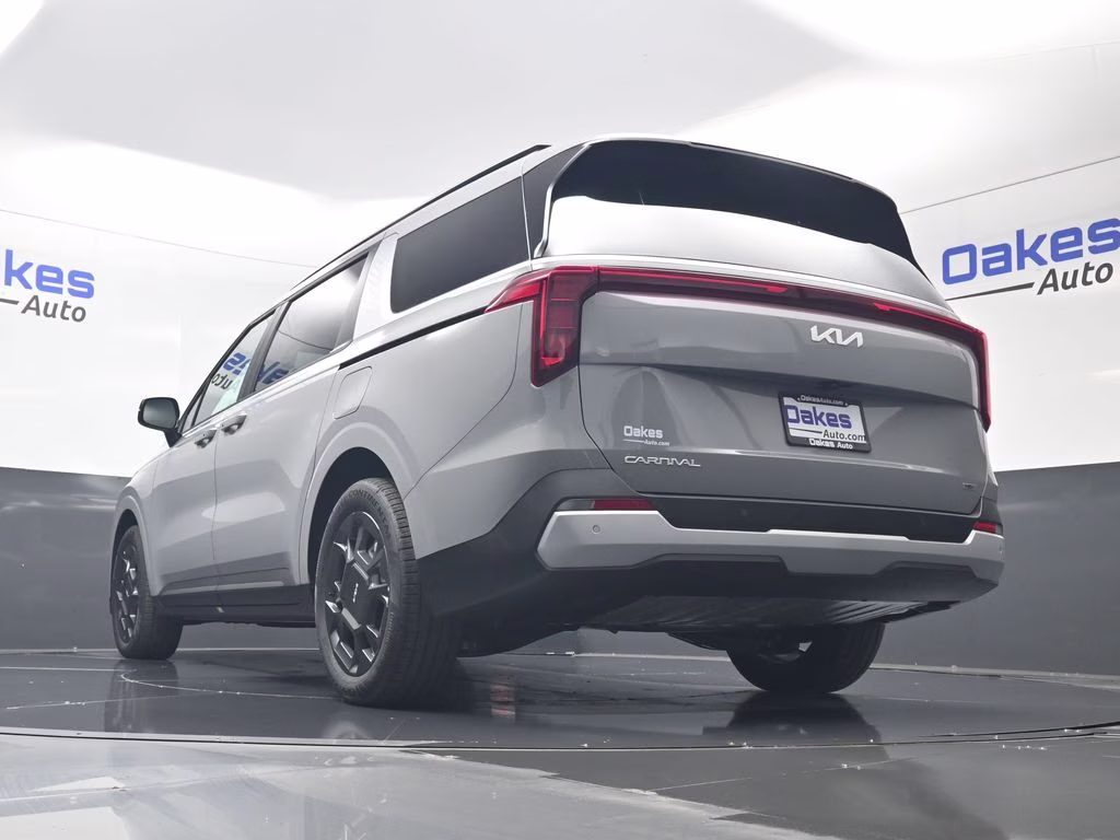 2026 Ceramic Silver Kia Carnival Hybrid EX FWD Van