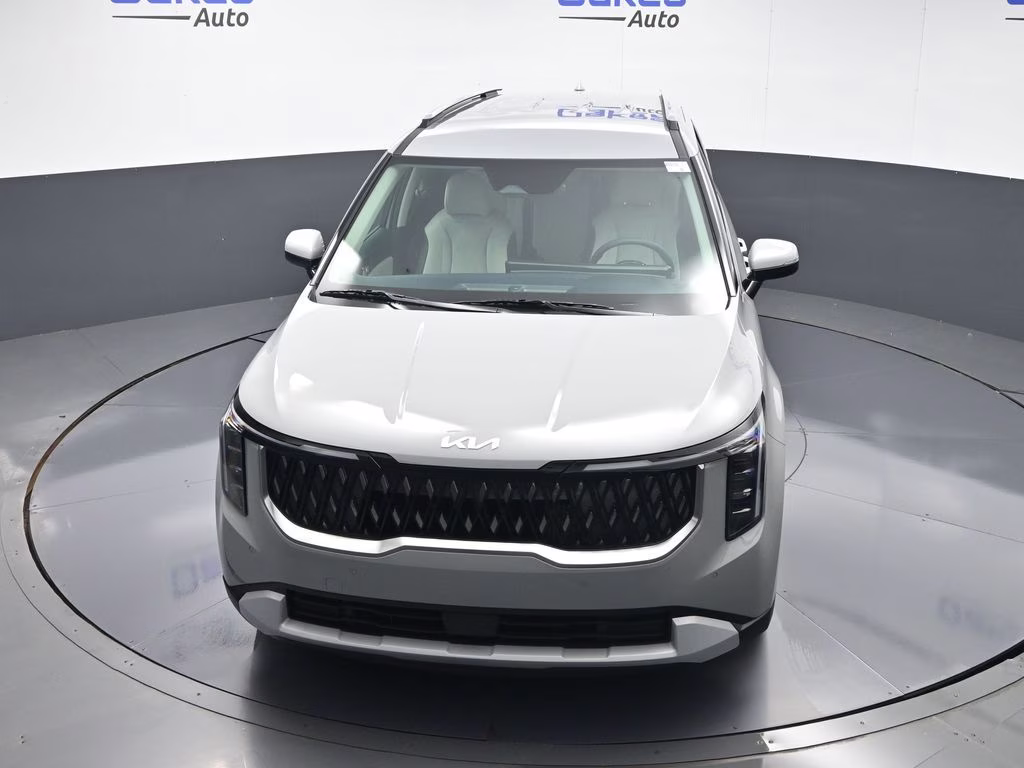 2026 Ceramic Silver Kia Carnival Hybrid EX FWD Van