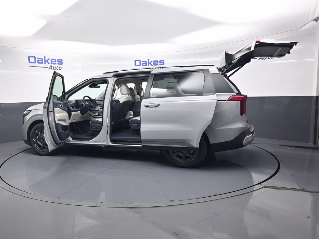 2026 Ceramic Silver Kia Carnival Hybrid EX FWD Van