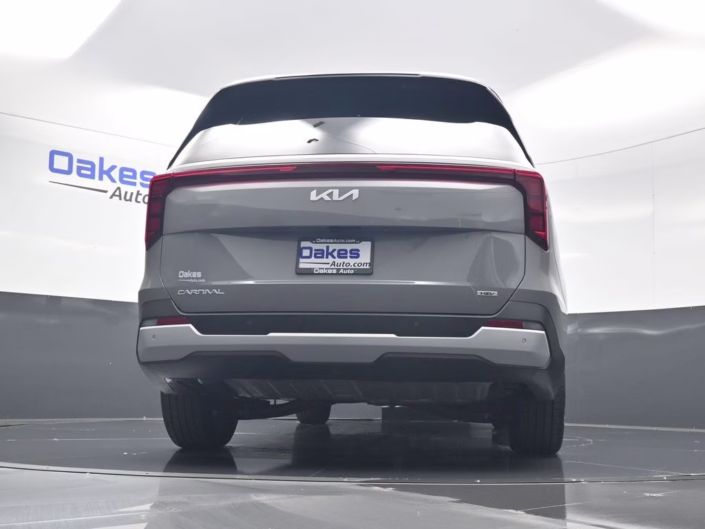 2026 Ceramic Silver Kia Carnival Hybrid EX FWD Van