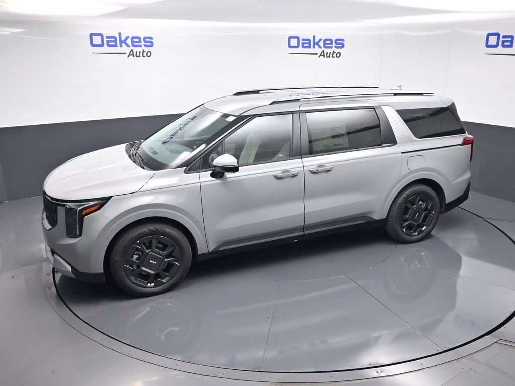 2026 Ceramic Silver Kia Carnival Hybrid EX FWD Van
