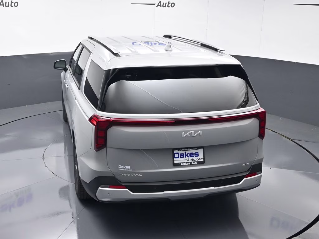 2026 Ceramic Silver Kia Carnival Hybrid EX FWD Van