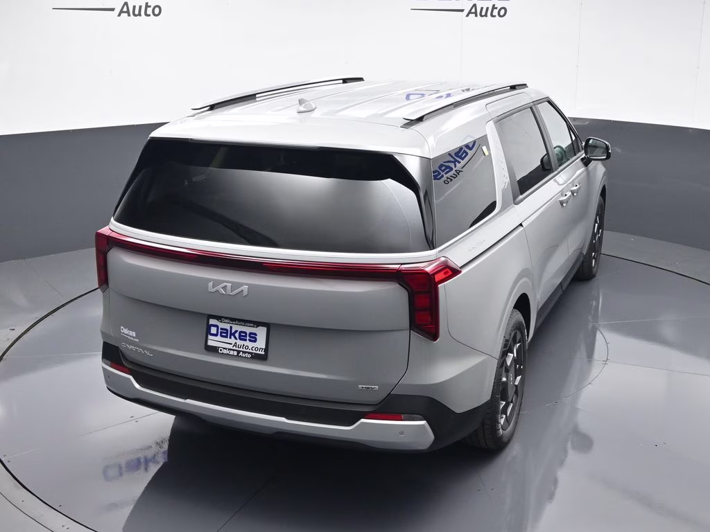 2026 Ceramic Silver Kia Carnival Hybrid EX FWD Van