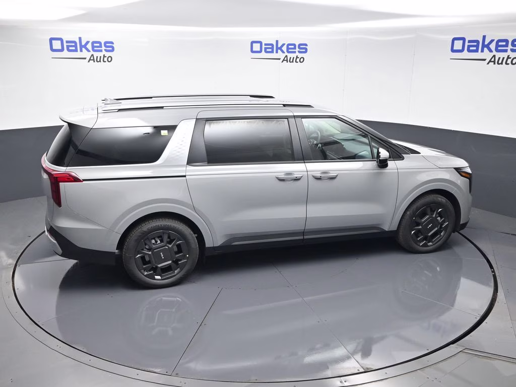 2026 Ceramic Silver Kia Carnival Hybrid EX FWD Van