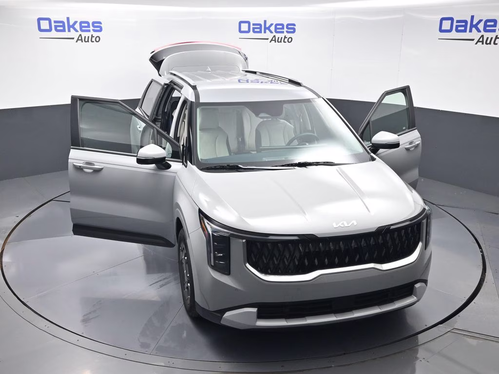 2026 Ceramic Silver Kia Carnival Hybrid EX FWD Van