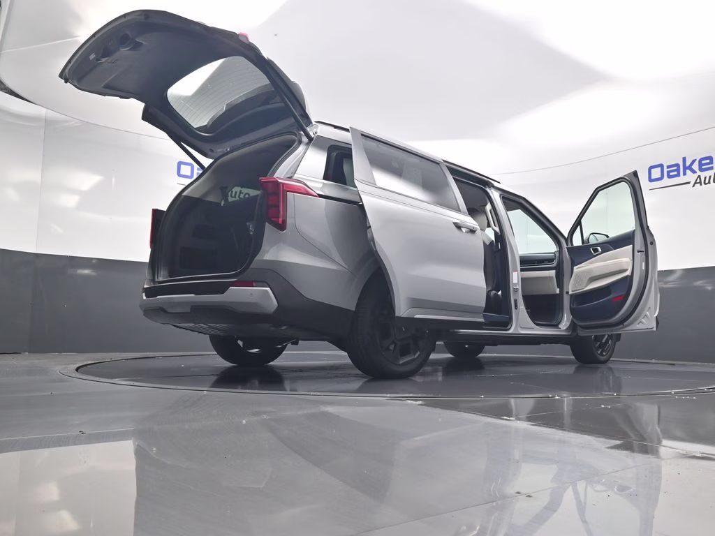 2026 Ceramic Silver Kia Carnival Hybrid EX FWD Van