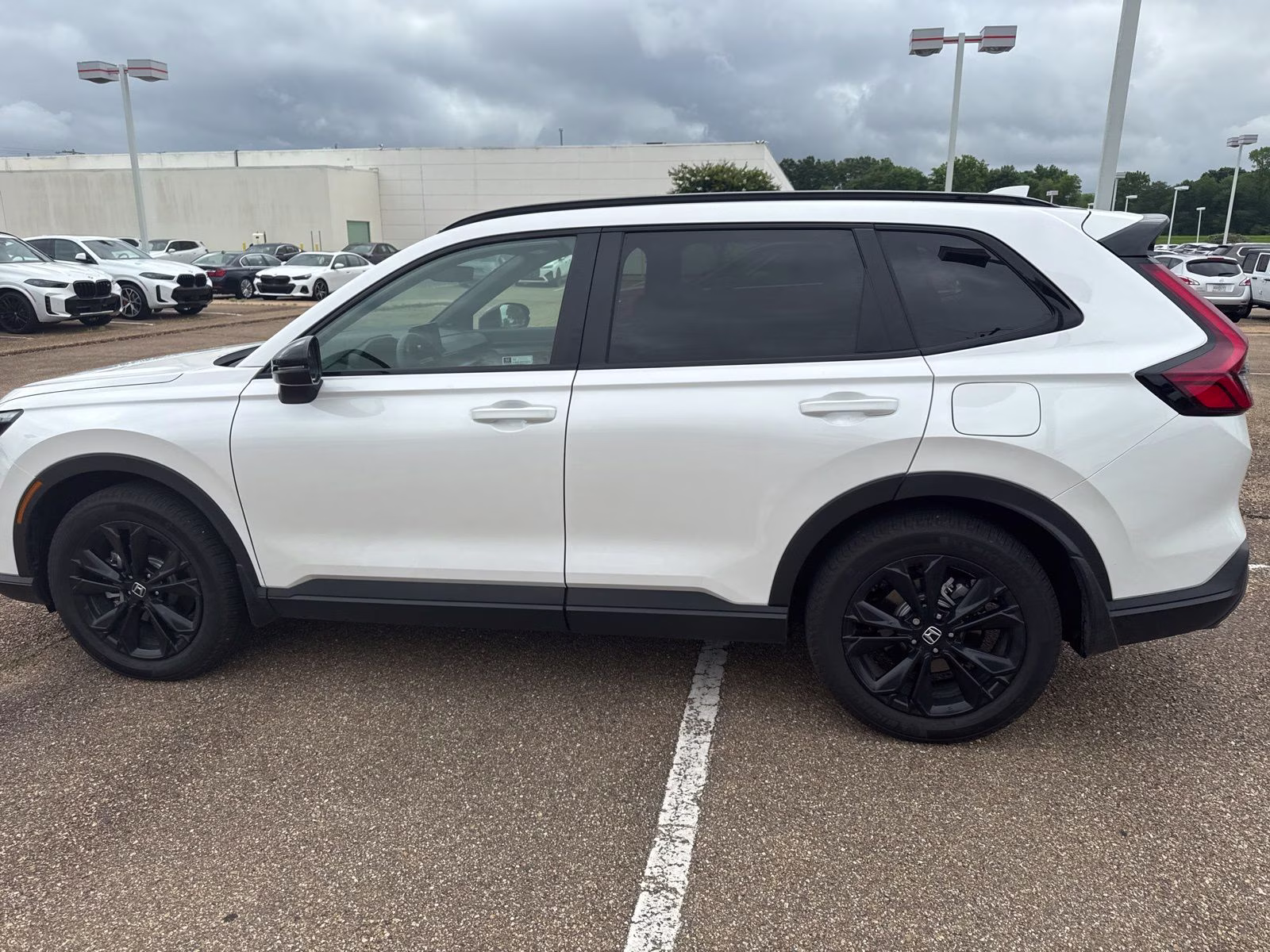 2026 Platinum White Pearl Honda CR-V Hybrid Sport Touring AWD SUV