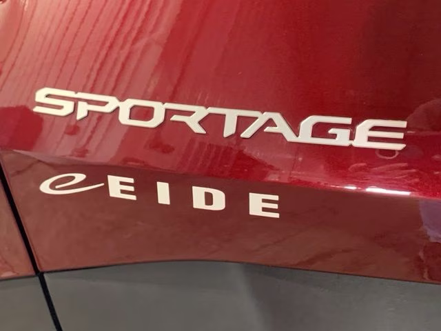 2023 Dawning Red Kia Sportage X-Pro Prestige AWD SUV