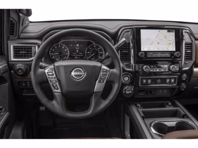 2023 Pearl White Metallic Nissan Titan Platinum Reserve 4X4 Truck