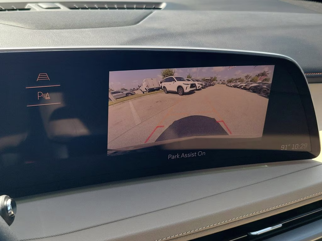 2024 Emerald Lake Metallic Cadillac XT4 Luxury FWD SUV