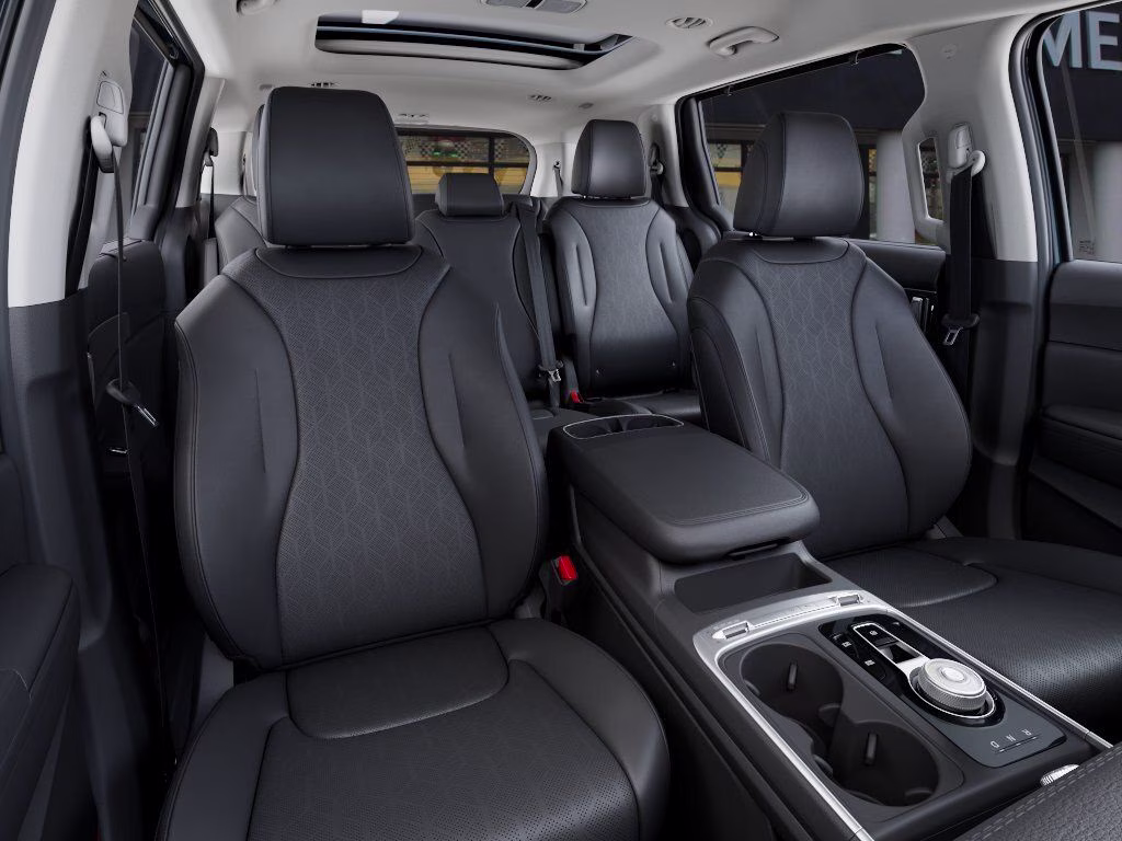 2026 Astra Blue Kia Carnival Hybrid SX FWD Van