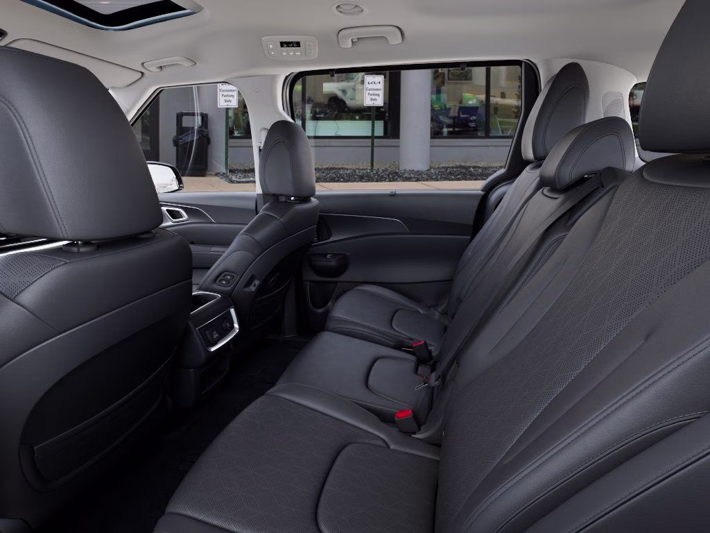 2026 Astra Blue Kia Carnival Hybrid SX FWD Van