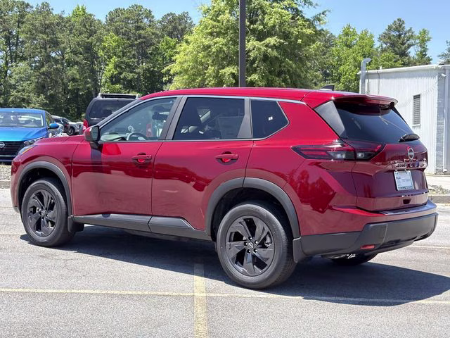 2026 Scarlet Ember Tintcoat Nissan Rogue SV FWD SUV