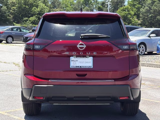 2026 Scarlet Ember Tintcoat Nissan Rogue SV FWD SUV