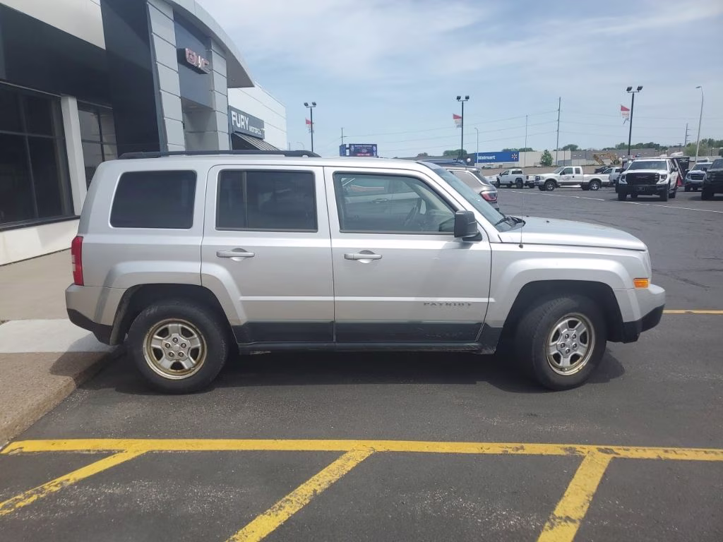 2011 Bright Silver Metallic Jeep Patriot Sport FWD SUV