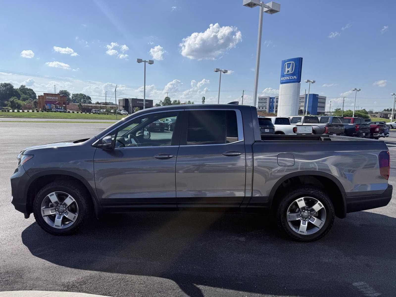 2025 Modern Steel Metallic Honda Ridgeline RTL AWD Truck