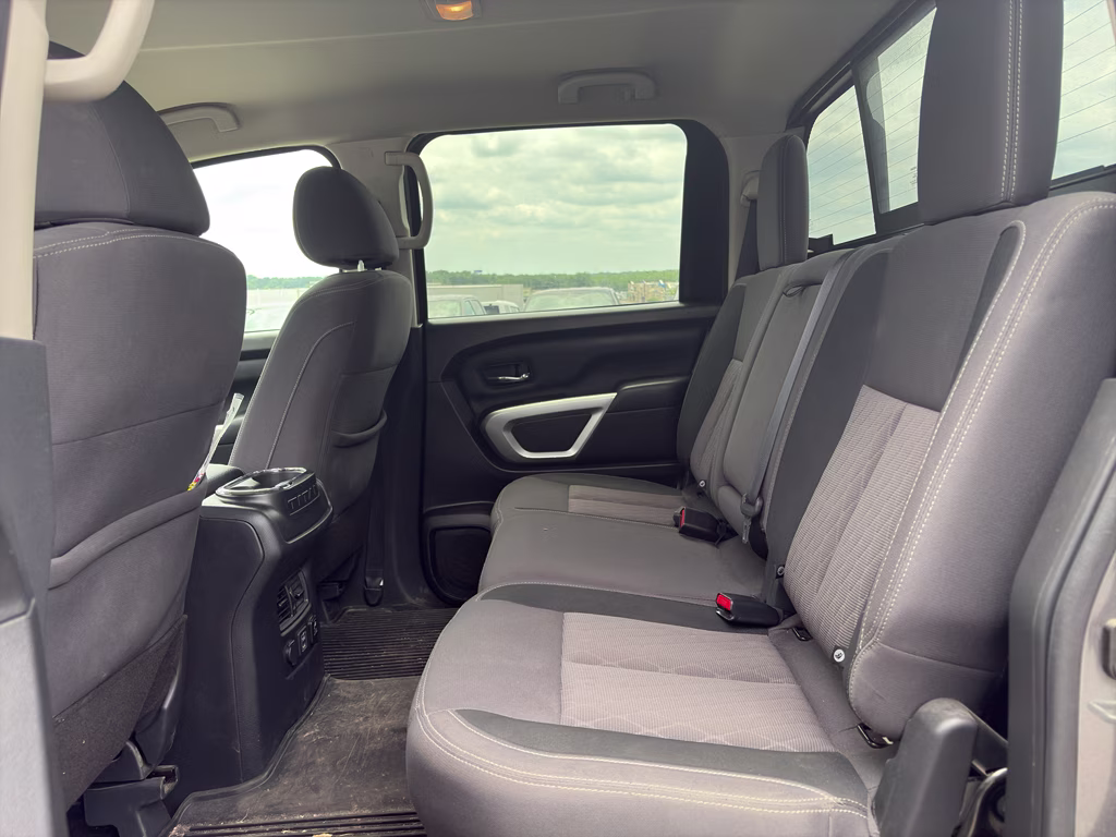 2024 Gun Metallic Nissan Titan SV 4X4 Truck