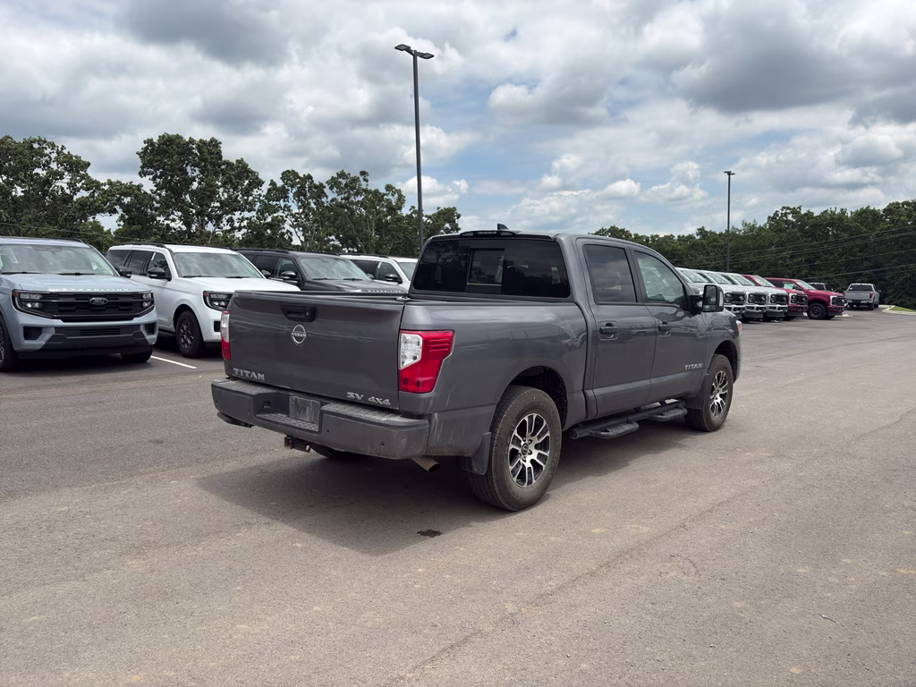 2024 Gun Metallic Nissan Titan SV 4X4 Truck