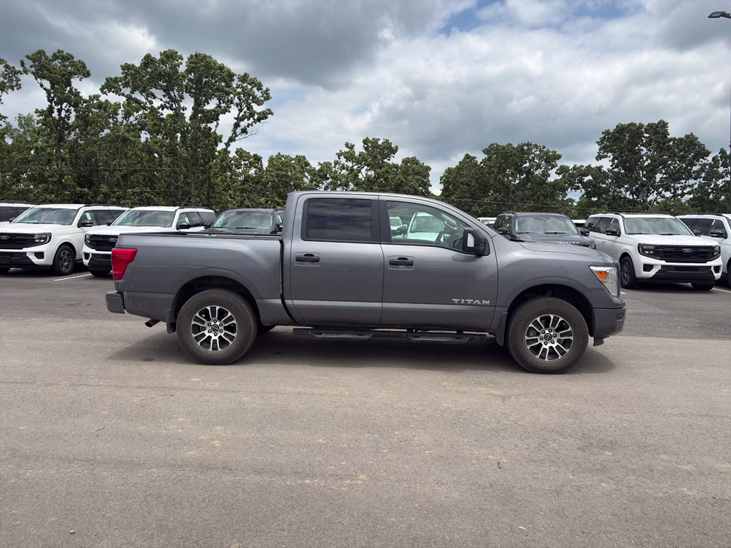 2024 Gun Metallic Nissan Titan SV 4X4 Truck