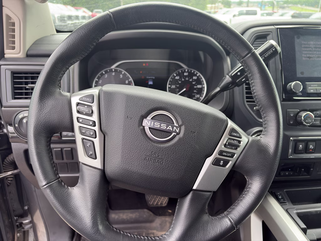 2024 Gun Metallic Nissan Titan SV 4X4 Truck
