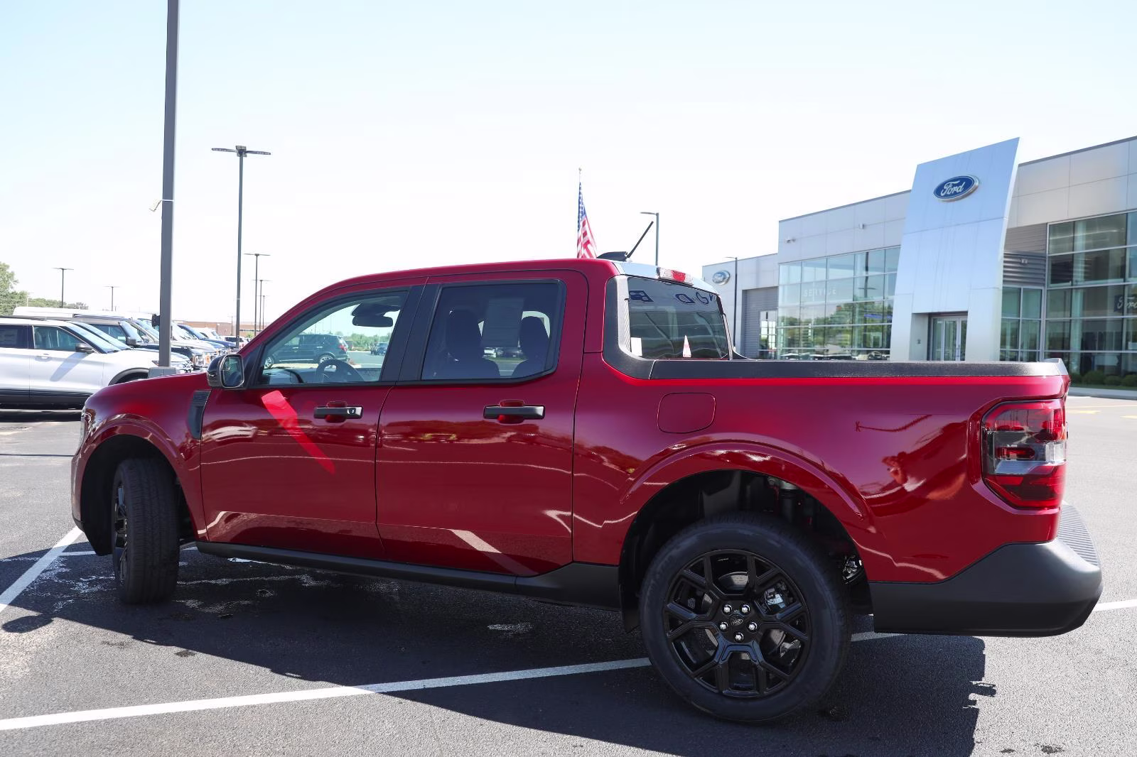 2026 Ruby Red Metallic Tinted Clearcoat Ford Maverick XLT AWD Truck