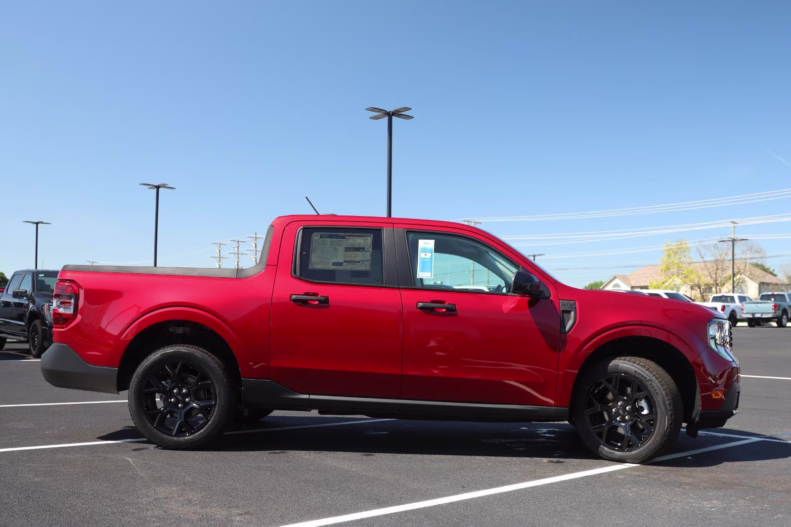 2026 Ruby Red Metallic Tinted Clearcoat Ford Maverick XLT AWD Truck