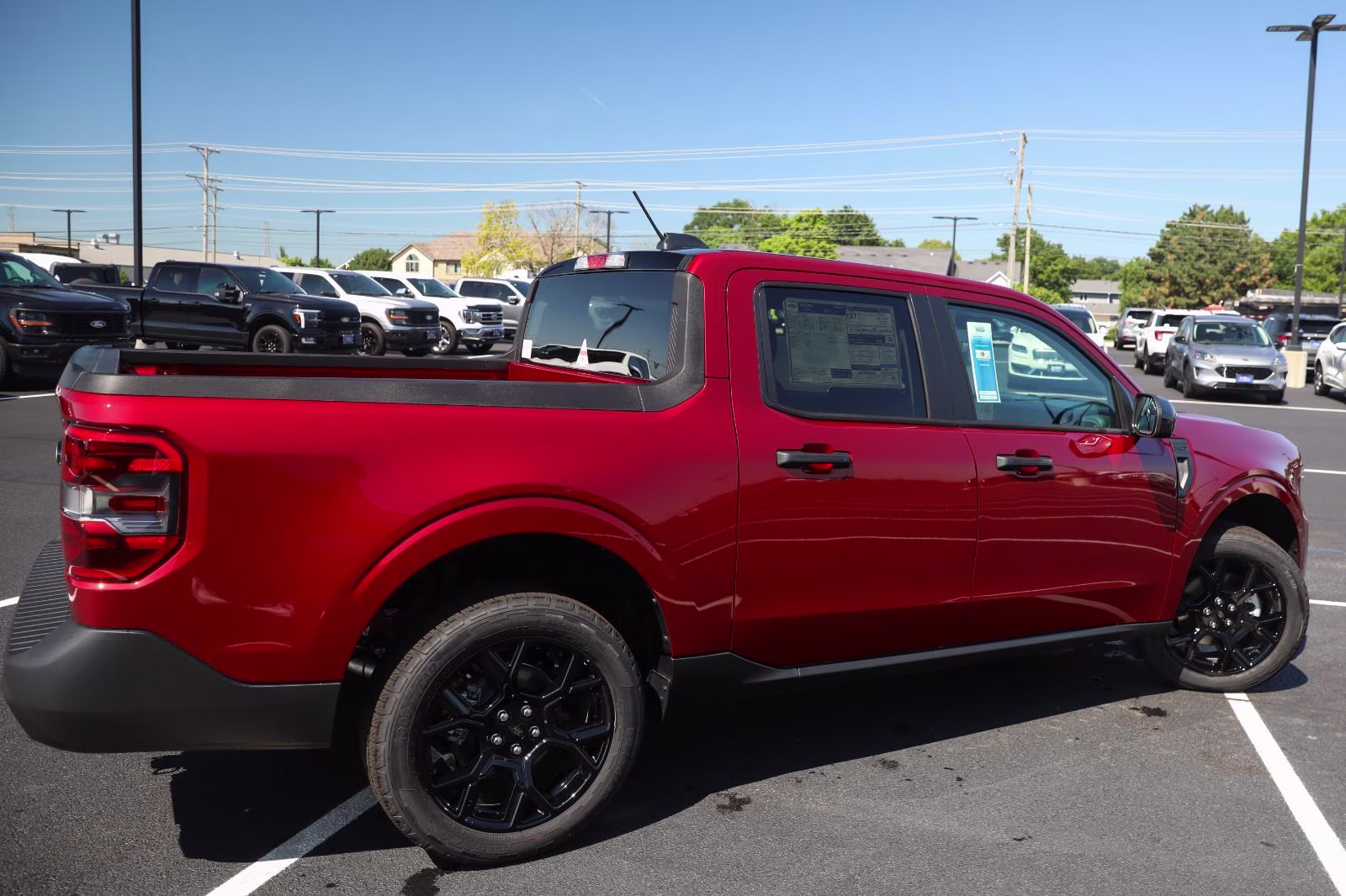 2026 Ruby Red Metallic Tinted Clearcoat Ford Maverick XLT AWD Truck