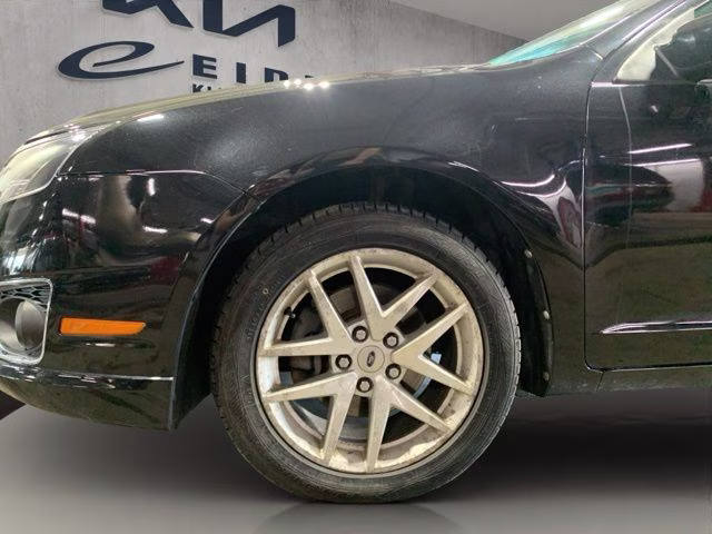 2012 Tuxedo Black Ford Fusion SEL FWD Sedan