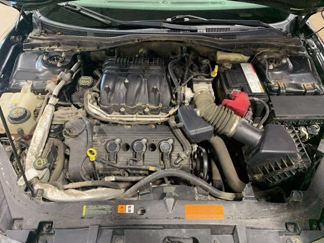 2012 Tuxedo Black Ford Fusion SEL FWD Sedan