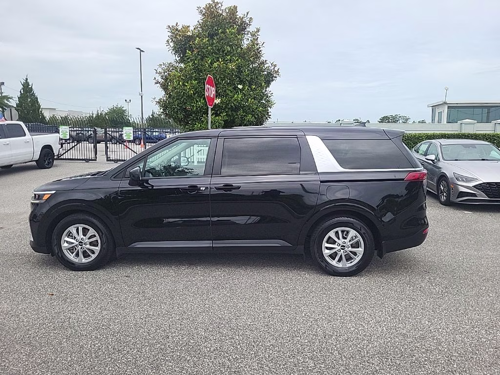2022 Aurora Black Kia Carnival LX FWD Van