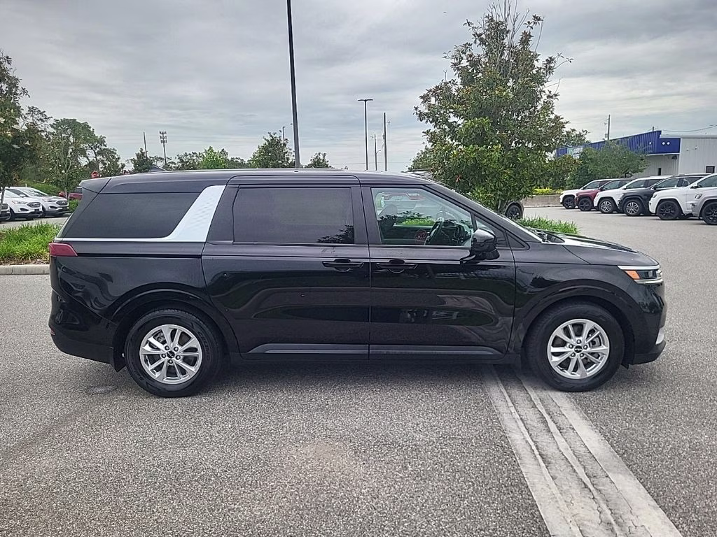 2022 Aurora Black Kia Carnival LX FWD Van