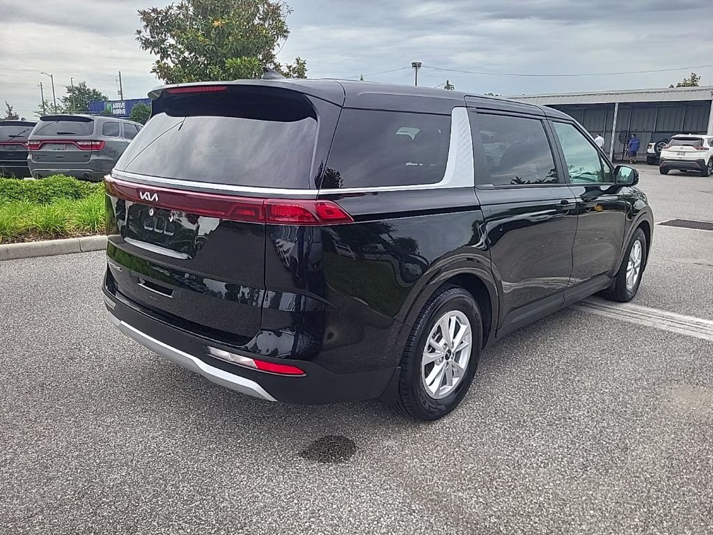2022 Aurora Black Kia Carnival LX FWD Van