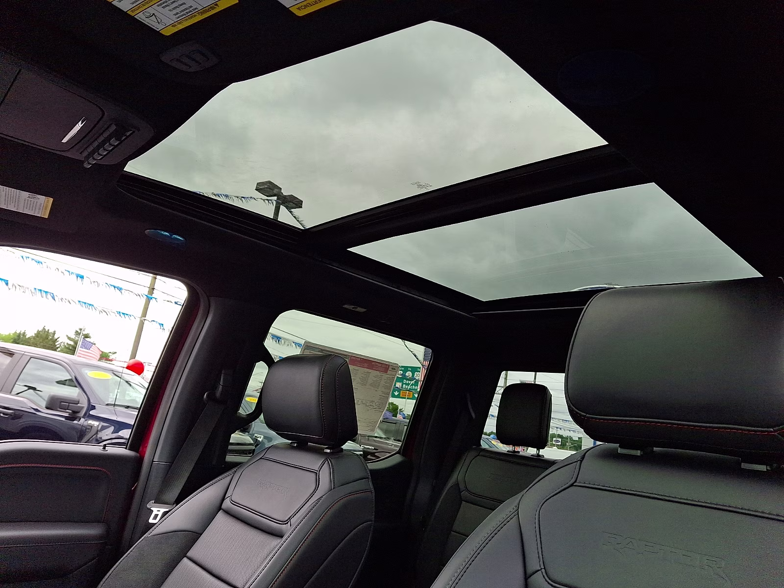 2026 Ruby Red Metallic Tinted Clearcoat - RR Ford F-150 Raptor 4X4