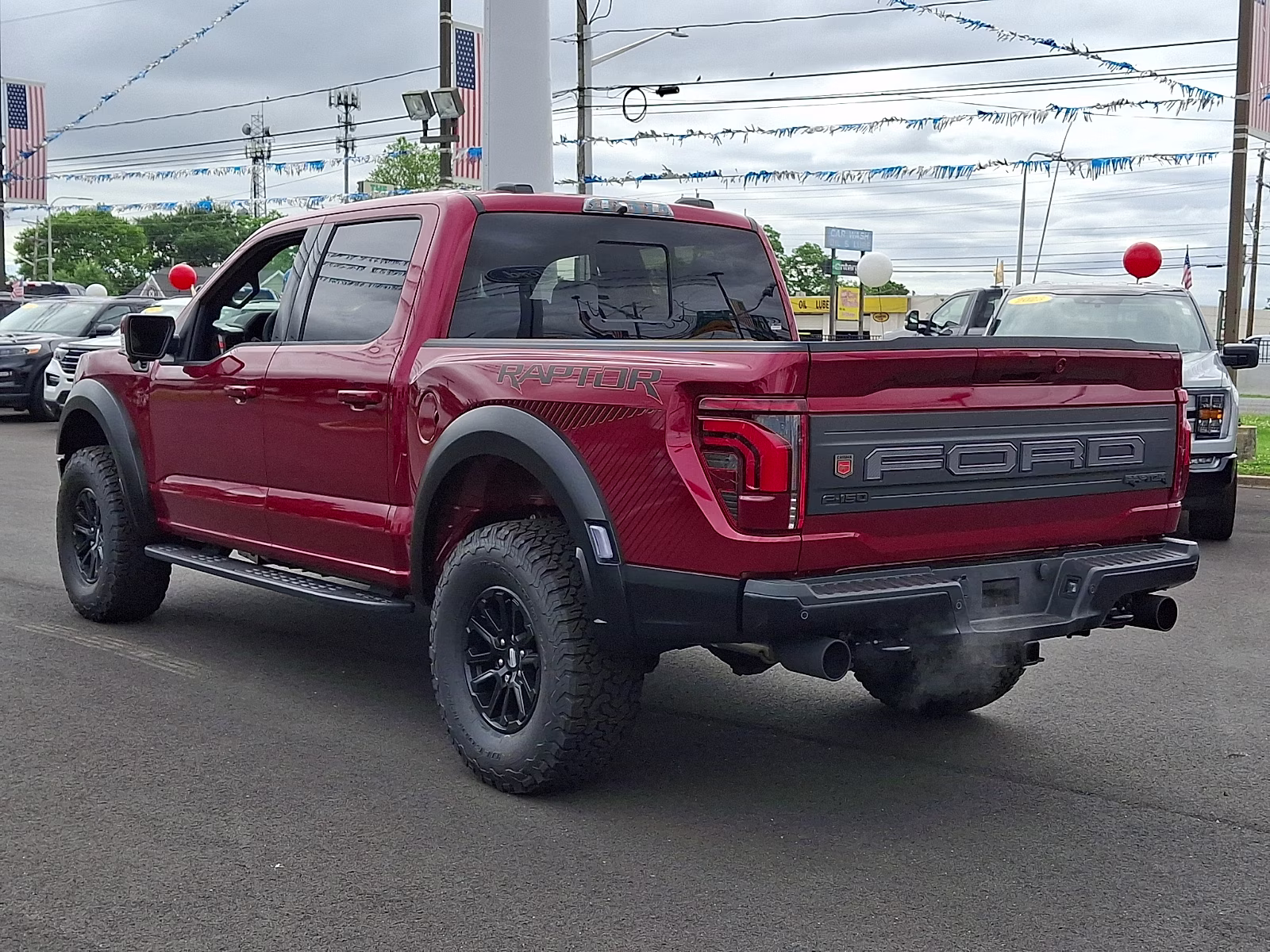 2026 Ruby Red Metallic Tinted Clearcoat - RR Ford F-150 Raptor 4X4
