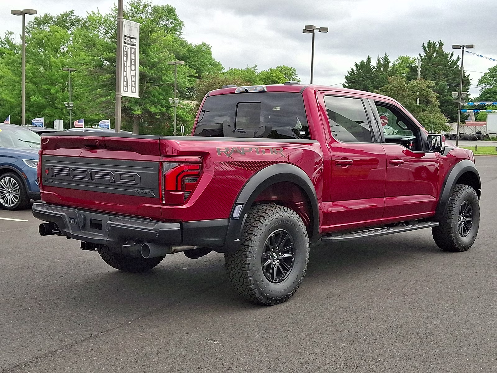 2026 Ruby Red Metallic Tinted Clearcoat - RR Ford F-150 Raptor 4X4