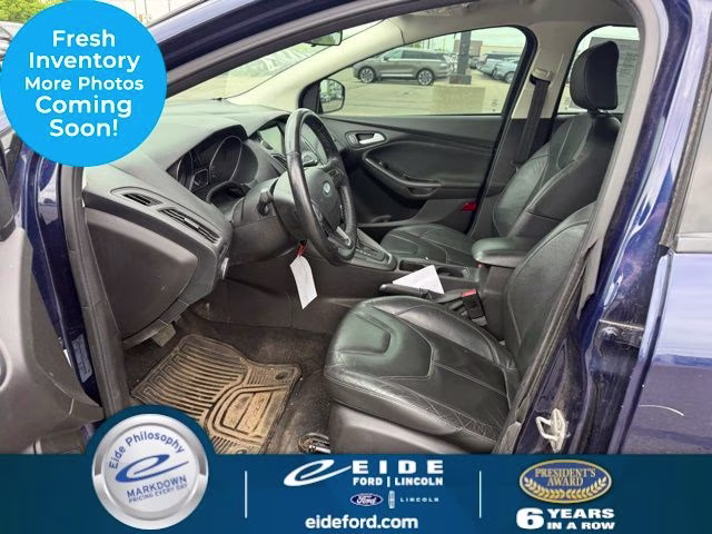 2016 Blue Ford Focus SE FWD Sedan