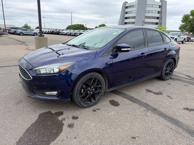 2016 Blue Ford Focus SE FWD Sedan