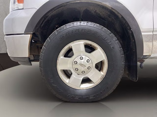 2005 Silver Clearcoat Metallic Ford F-150 XLT 4X4 Truck