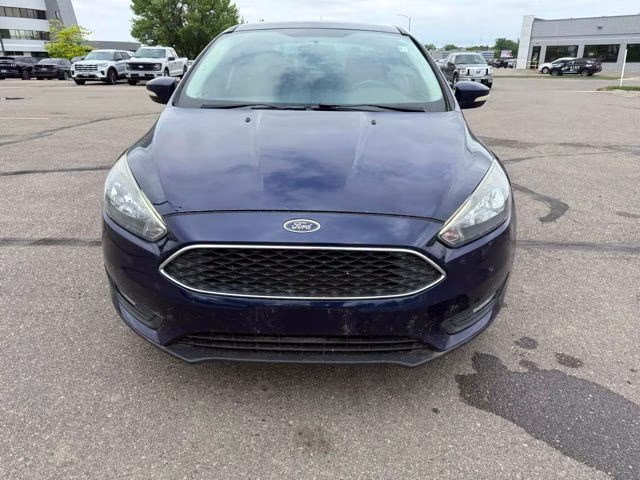 2016 Blue Ford Focus SE FWD Sedan