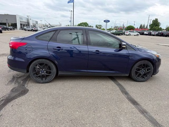 2016 Blue Ford Focus SE FWD Sedan