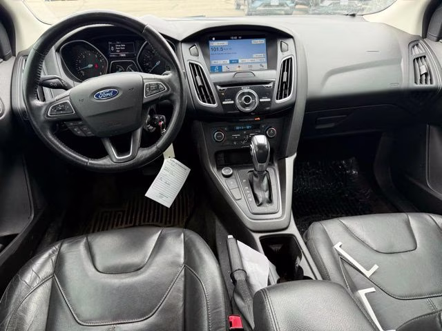 2016 Blue Ford Focus SE FWD Sedan