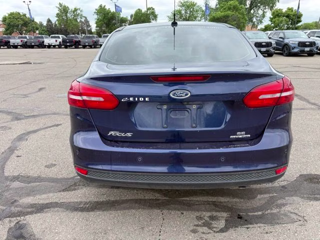 2016 Blue Ford Focus SE FWD Sedan