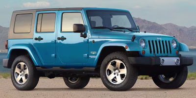 2010 Deep Water Blue Pearl Coat Jeep Wrangler Unlimited Sahara 4X4 SUV