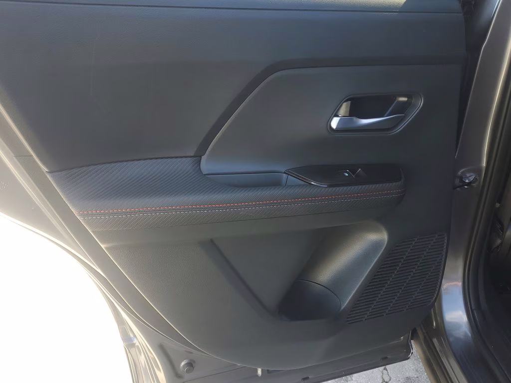 2025 Gun Metallic/Super Black Nissan Kicks SR FWD SUV