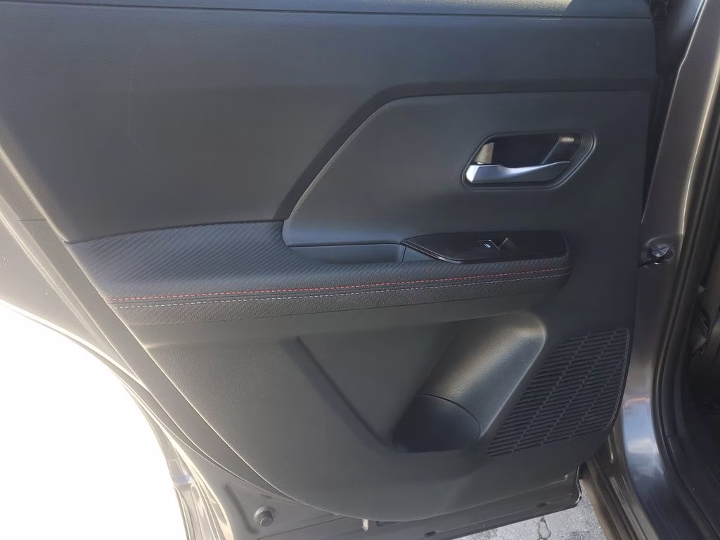 2025 Gun Metallic/Super Black Nissan Kicks SR FWD SUV