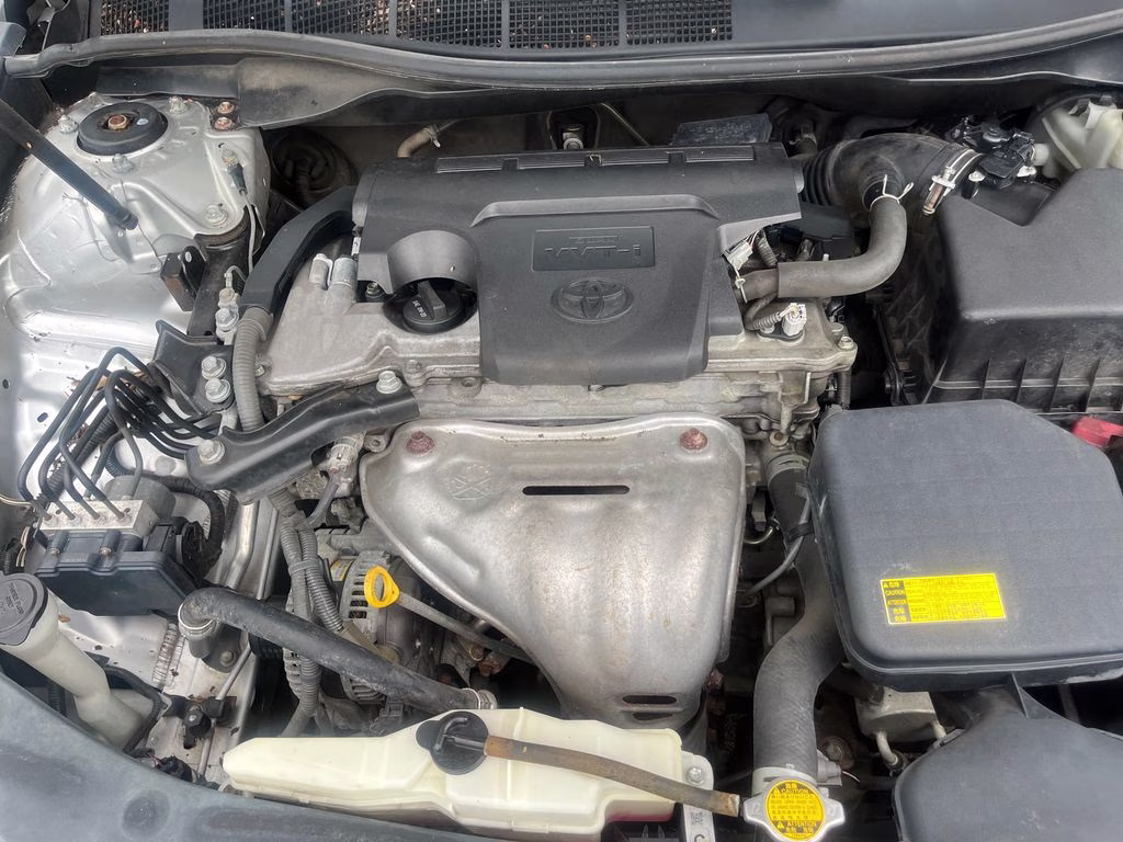 2012 Classic Silver Metallic Toyota Camry LE FWD Sedan