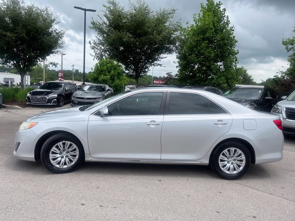 2012 Classic Silver Metallic Toyota Camry LE FWD Sedan