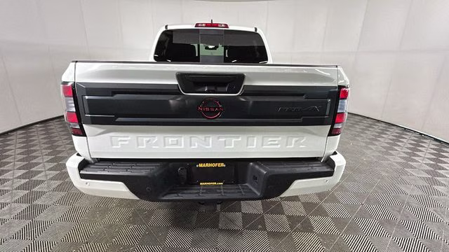 2025 Glacier White Nissan Frontier PRO-4X 4X4 Truck
