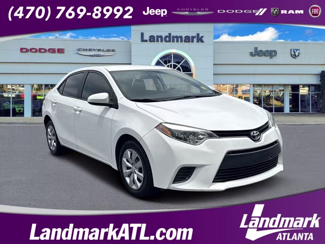 2015 Super White Toyota Corolla LE FWD Sedan