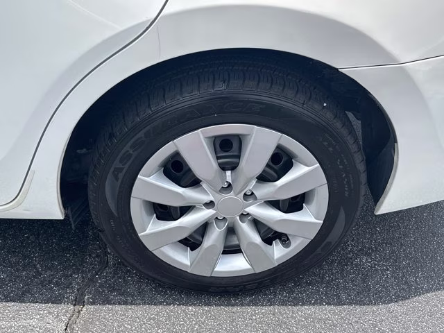 2015 Super White Toyota Corolla LE FWD Sedan